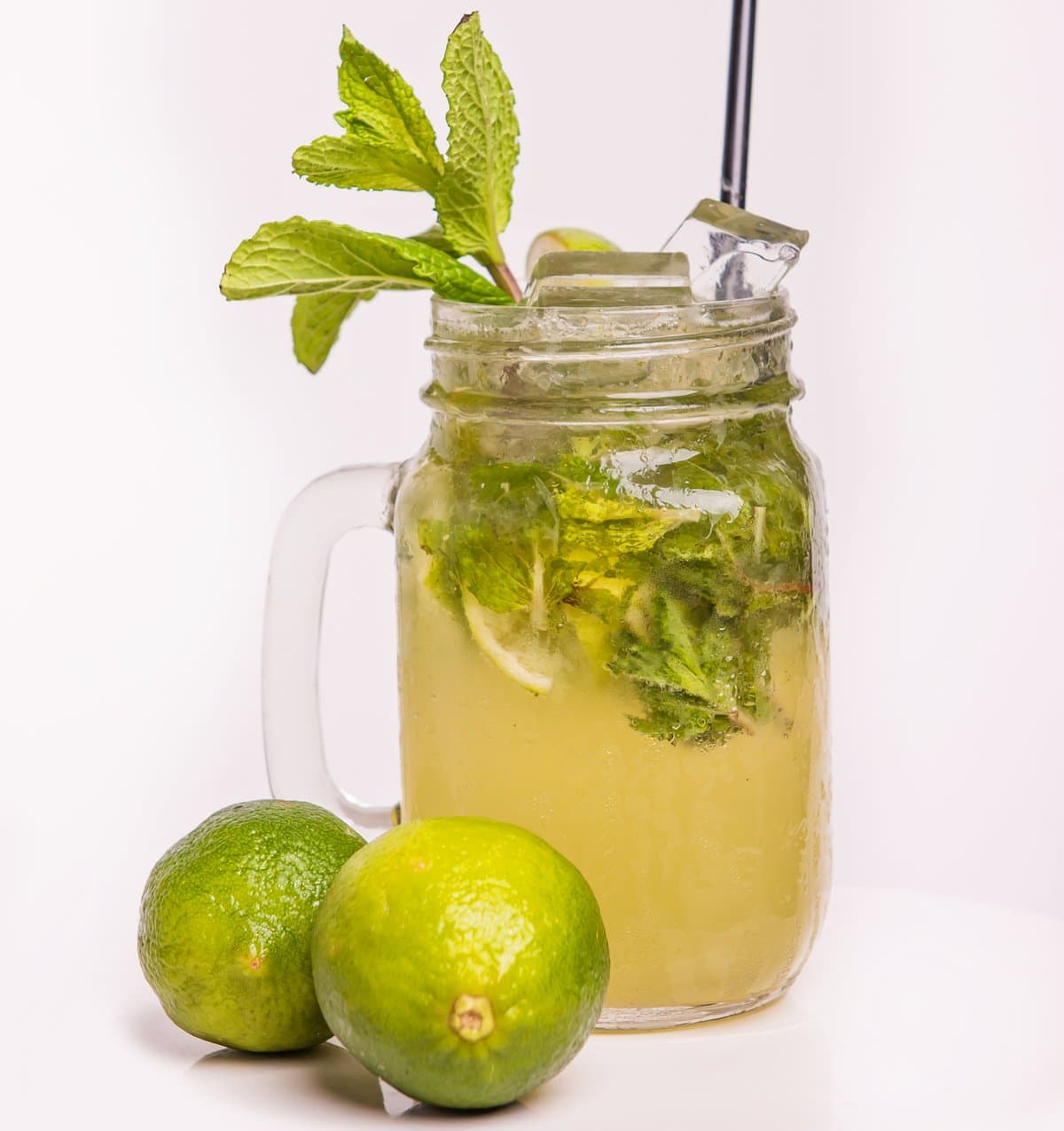 A Don Ramon mojito served in a mason jar with fresh mint and limes